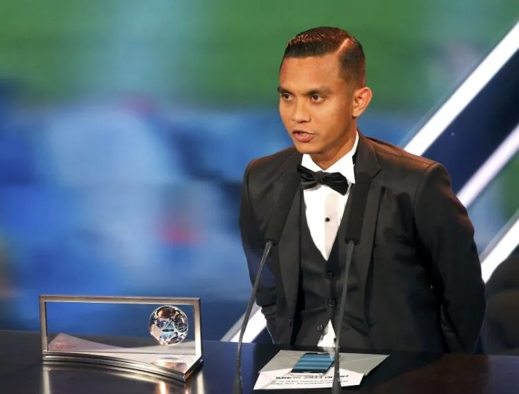 Football Soccer - FIFA Awards Ceremony - Puskas Award - Zurich, Switzerland - 09/01/17. Mohd Faiz Subri receives the award. REUTERS/Ruben Sprich