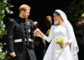 Britain's Prince Harry, Duke of Sussex and his wife Meghan, Duchess of Sussex emerge from the West Door of St George's Chapel, Windsor Castle, in Windsor, on May 19, 2018 after their wedding ceremony. / AFP PHOTO / POOL / Ben BirchallBEN BIRCHALL/AFP/Getty Images
