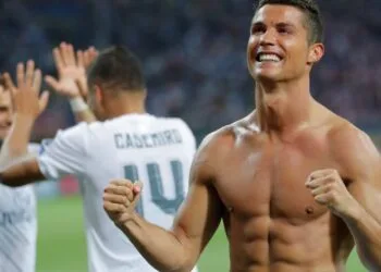 Real Madrid's Cristiano Ronaldo celebrates after scoring the winning penalty shot during the Champions League final soccer match between Real Madrid and Atletico Madrid at the San Siro stadium in Milan, Italy, Saturday, May 28, 2016. Real Madrid won 5-4 on penalties after the match ended 1-1 after extra time. (AP Photo/Manu Fernandez) ORG XMIT: XAF257