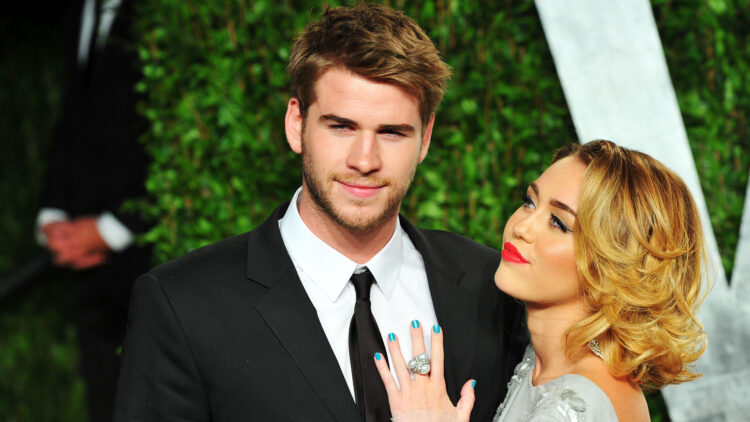WEST HOLLYWOOD, CA - FEBRUARY 26: Actor Liam Hemsworth (L) and entertainer Miley Cyrus arrive at the 2012 Vanity Fair Oscar Party hosted by Graydon Carter at Sunset Tower on February 26, 2012 in West Hollywood, California. (Photo by Alberto E. Rodriguez/Getty Images)