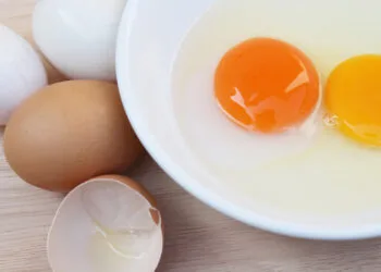 Duck egg yolk and hen egg yolk; Shutterstock ID 538399648