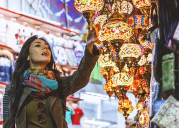 Beautiful young woman shopping in Grand Bazaar, Istanbul, Turkey