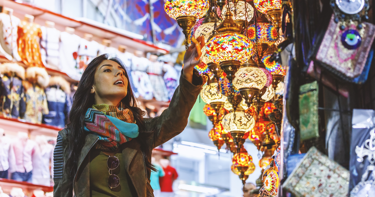 Beautiful young woman shopping in Grand Bazaar, Istanbul, Turkey