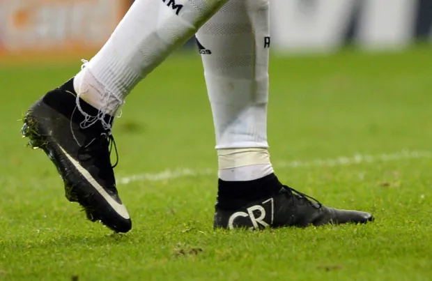 MADRID, SPAIN - DECEMBER 09: A detailed view of Cristiano Ronaldo of Real Madrid's boots are seen during the UEFA Champions League Group B football match between Real Madrid CF and PFC Ludogorets Razgrad at the Santiago Bernabeu Stadium in Madrid, Spain on December 9, 2014. (Photo by Evrim Aydin/Anadolu Agency/Getty Images)